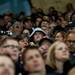 A fan watches the game between Michigan and Michigan State on Friday. Daniel Brenner I AnnArbor.com